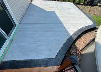 Broom Finished Concrete Patio with Stamped Border