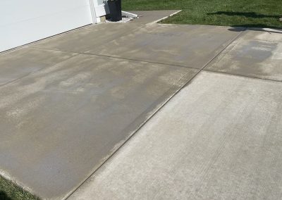 Broom finished concrete driveway with entrance way