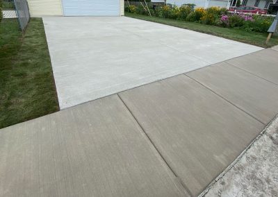 Broom finished concrete driveway and sidewalk