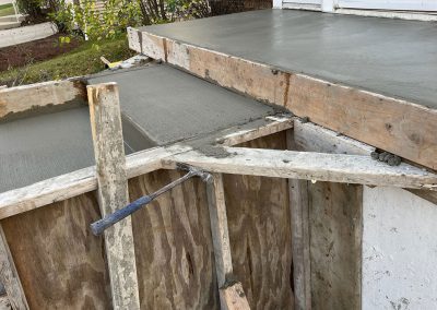 Broom finished concrete stairs and porch