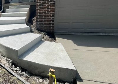 Broom finished concrete stairs and driveway