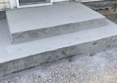 Stamped concrete stairs with colored powder release coating